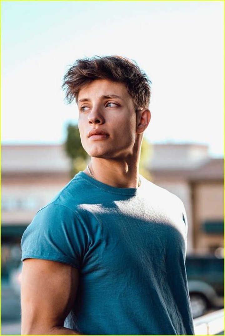 Download Matt Rife striking a pose at a photoshoot Wallpaper